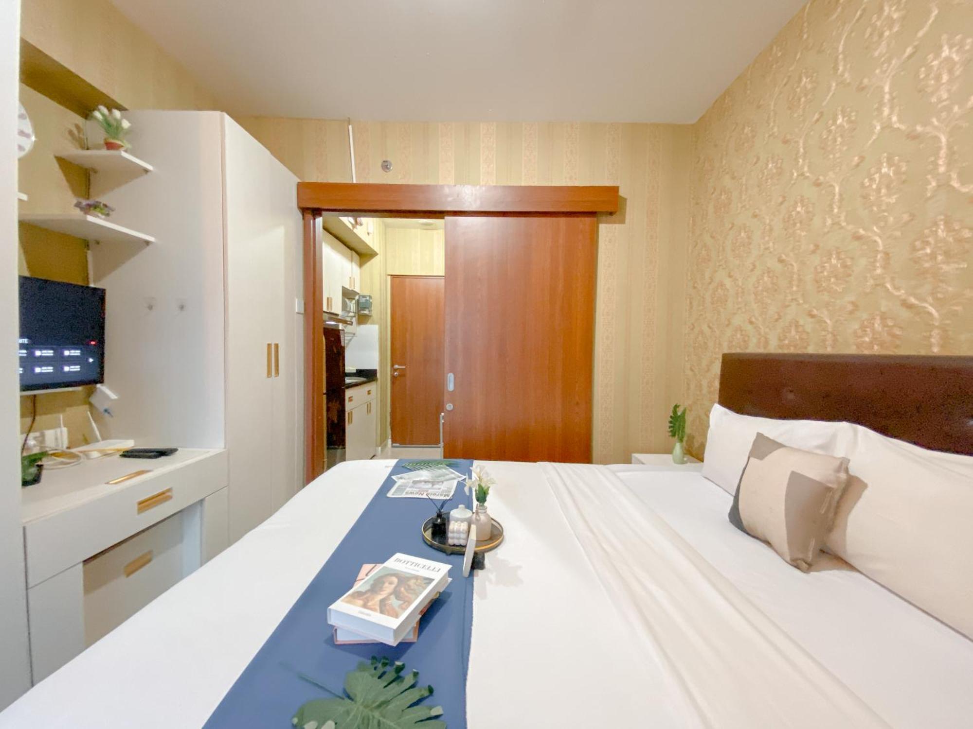 Apartemen Cozy Grand Kamala Lagoon By Travelio *